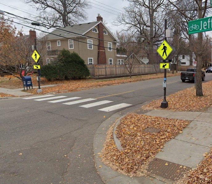 Rectangular Rapid Flashing Beacon on either side of the street. 