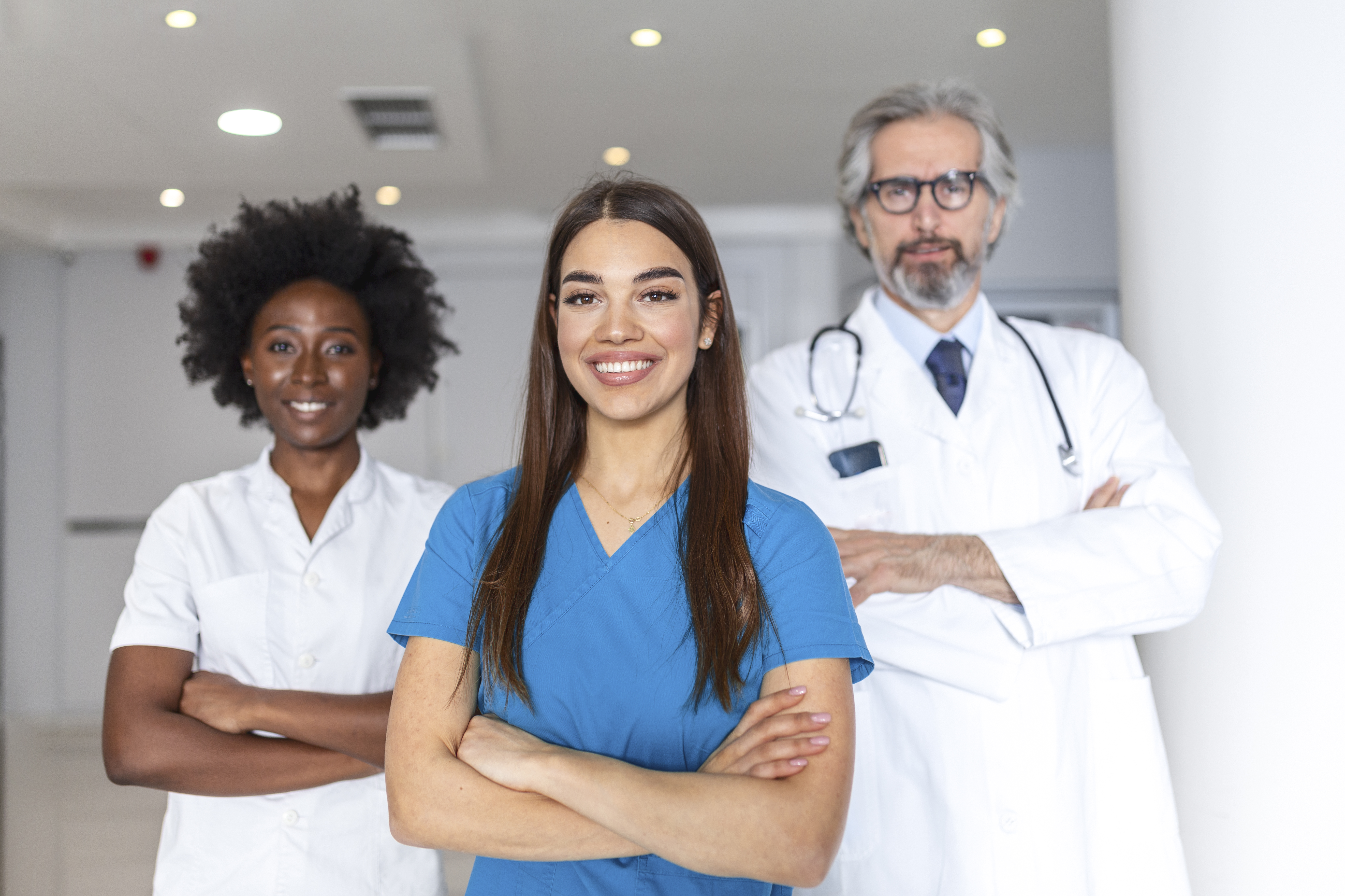 Group photo of doctors and nurses smiling