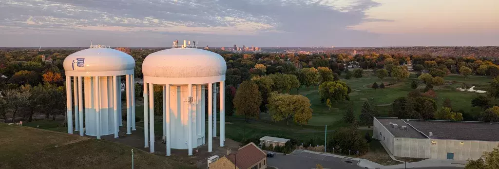 Highland water towers with SPRWS logo and St Paul skyline in background