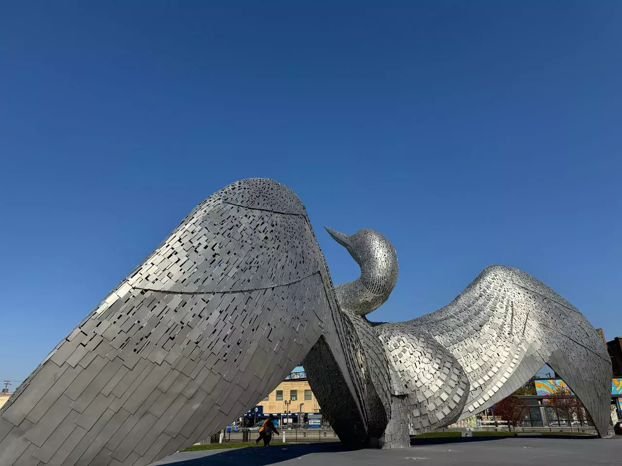 Large steel sculpture of a loon with outspread wings outside Allianz Field.