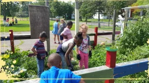 Children at a pollinator garden 