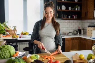 Woman Chopping Vegetables