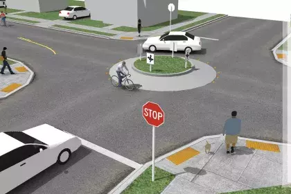 Rendering of a mini roundabout along a bike boulevard